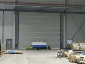comprare Porte in tessuto a sollevamento verticale fino a 1,2 metri al secondo con opzioni di controllo automatico e manuale, perfette per industrie, aeroporti e cantieri navali online manufacture