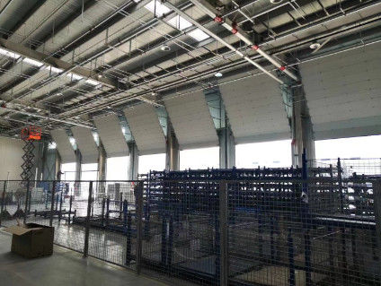 Porta di garage sezionale personalizzata Sicurezza ottimale per le vostre strutture
